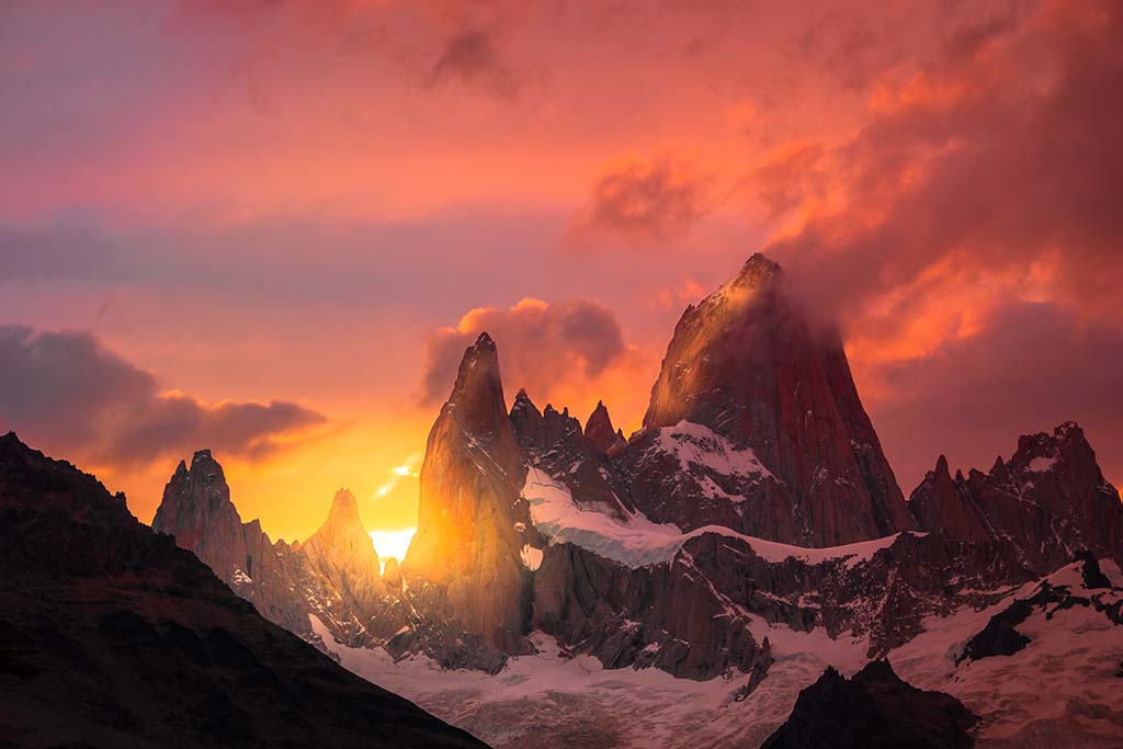 Sunset over Strait of Magellan and Snow Capped Mountains